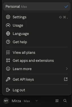 The claude.ai account menu opened from the name in the bottom-left corner, with Settings at the top